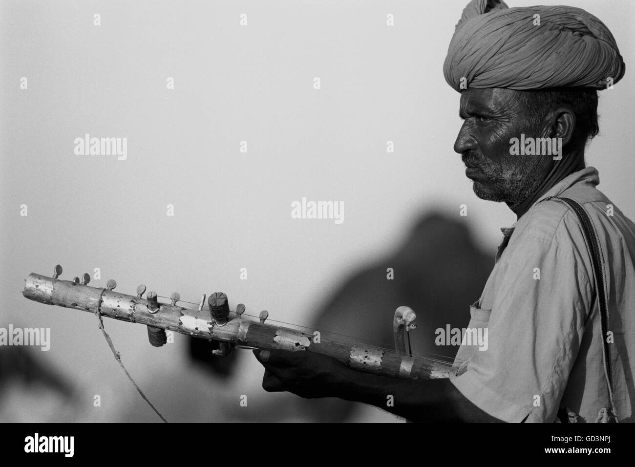 Man playing a musical instrument Stock Photo