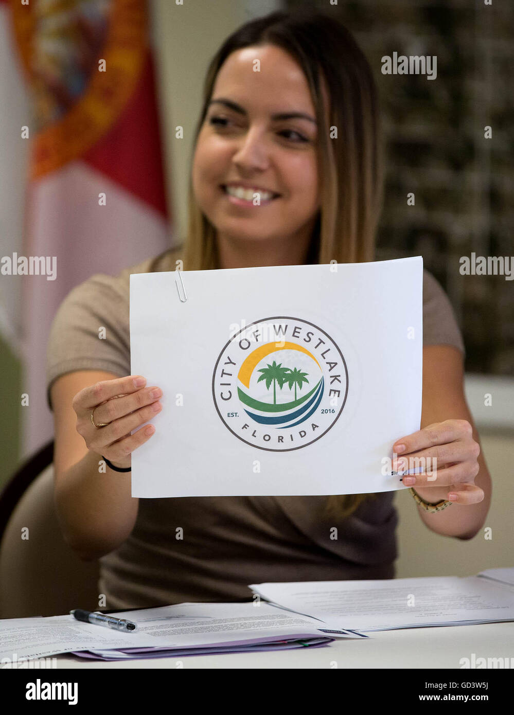 Wellington, Florida, USA. 11th July, 2016. City council commissioner Kara Crump votes to approve the new City of Westlake city seal during a city council meeting in Westlake, Florida on July 11, 2016. © Allen Eyestone/The Palm Beach Post/ZUMA Wire/Alamy Live News Stock Photo