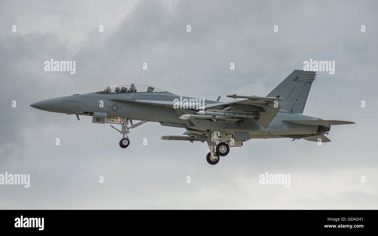 Farnborough, Hampshire UK. 12th July 2016. Boeing F/A-18 Flying Display. Day 2 of the Farnborough International Trade Airshow and flying demonstrations of commercial and military aircraft proceed in cloudy weather. Credit:  aviationimages/Alamy Live News. Stock Photo