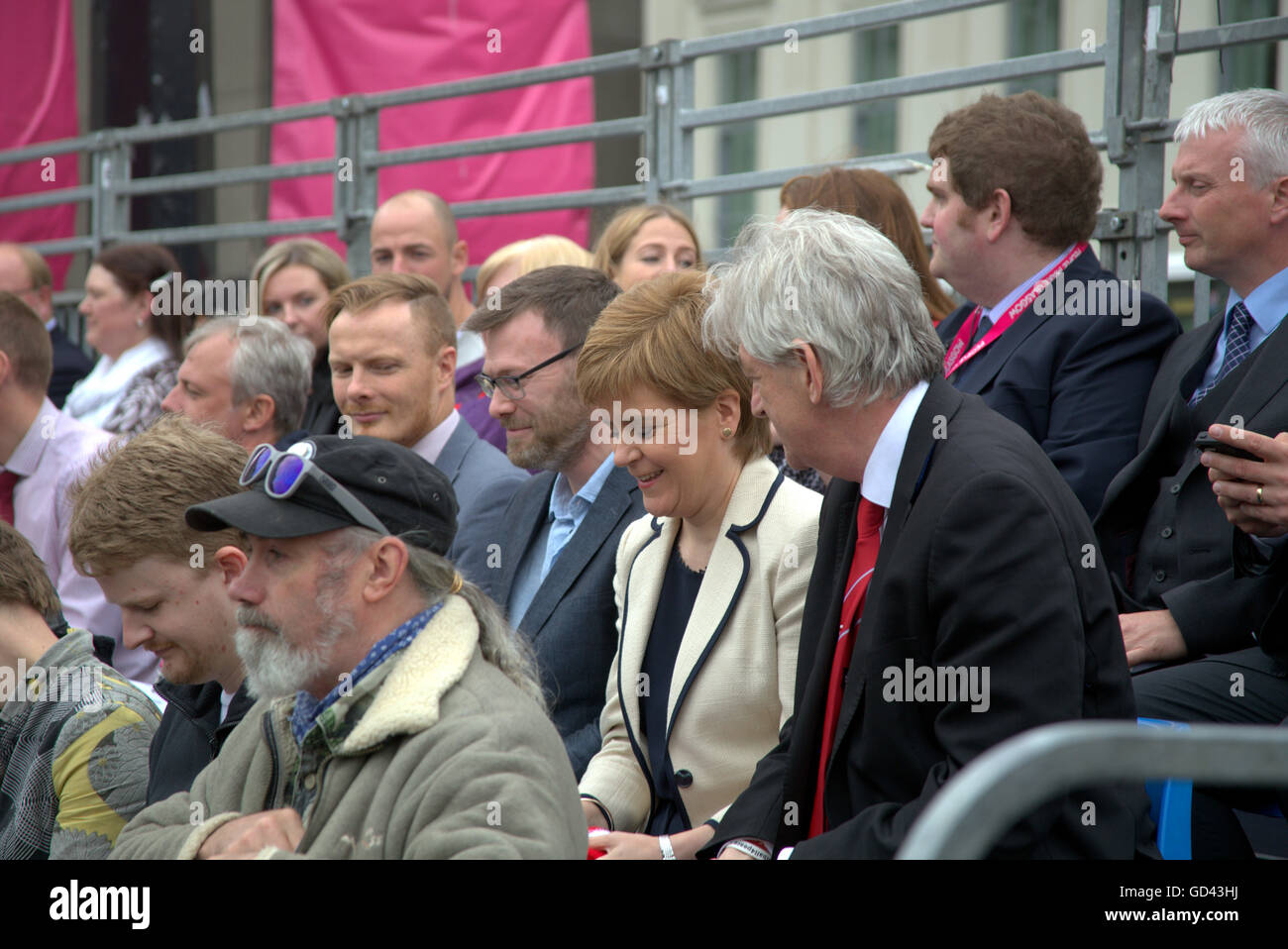 Glasgow, Scotland, UK 12th July 2016. Nicola Sturgeon dons See You Jimmy hat  at  Homeless World Cup in the heart of Glasgow, ,a seven day event, in Glasgow’s George Square will be “the most inspiring place on the planet.” Attended today by Nicola Sturgeon Scotland’s first minister.  Credit:  Gerard Ferry/Alamy Live News Stock Photo