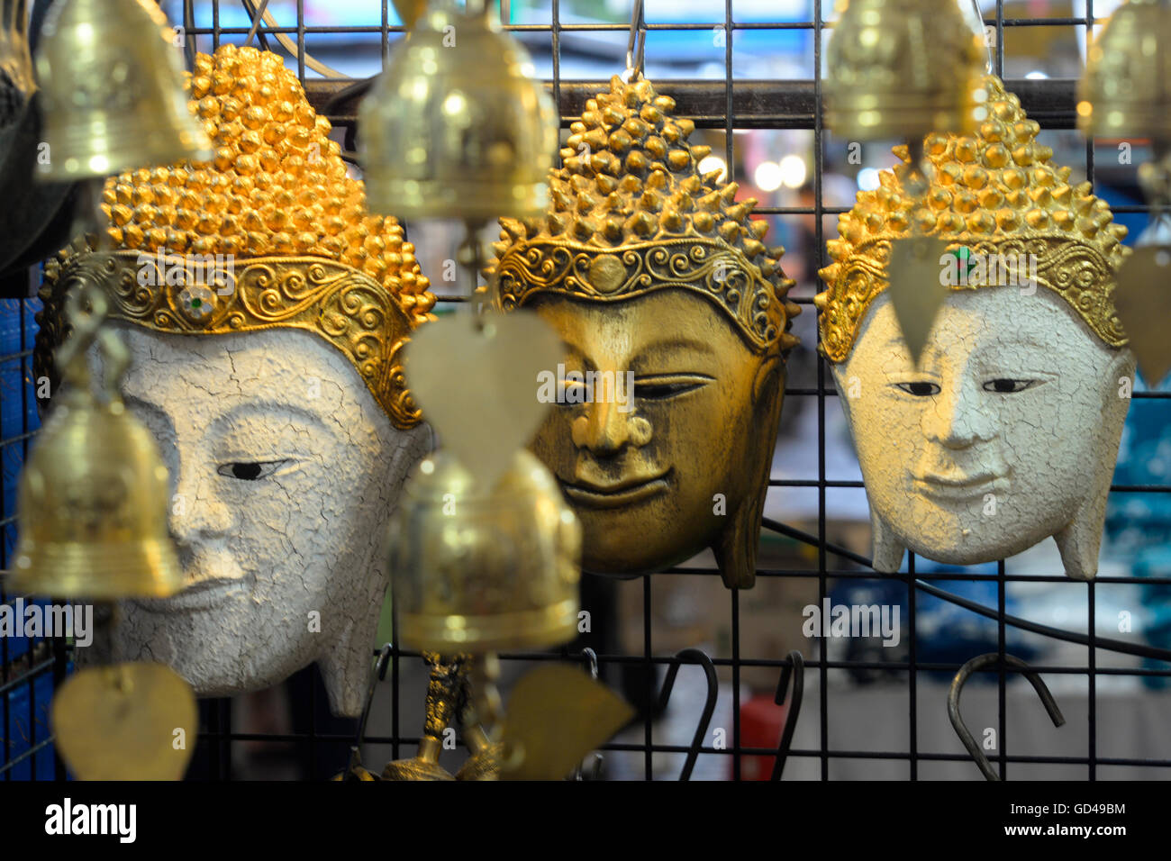 Ornamental masks for sale at Anusarn market, Chiang Mai, Thailand Stock Photo