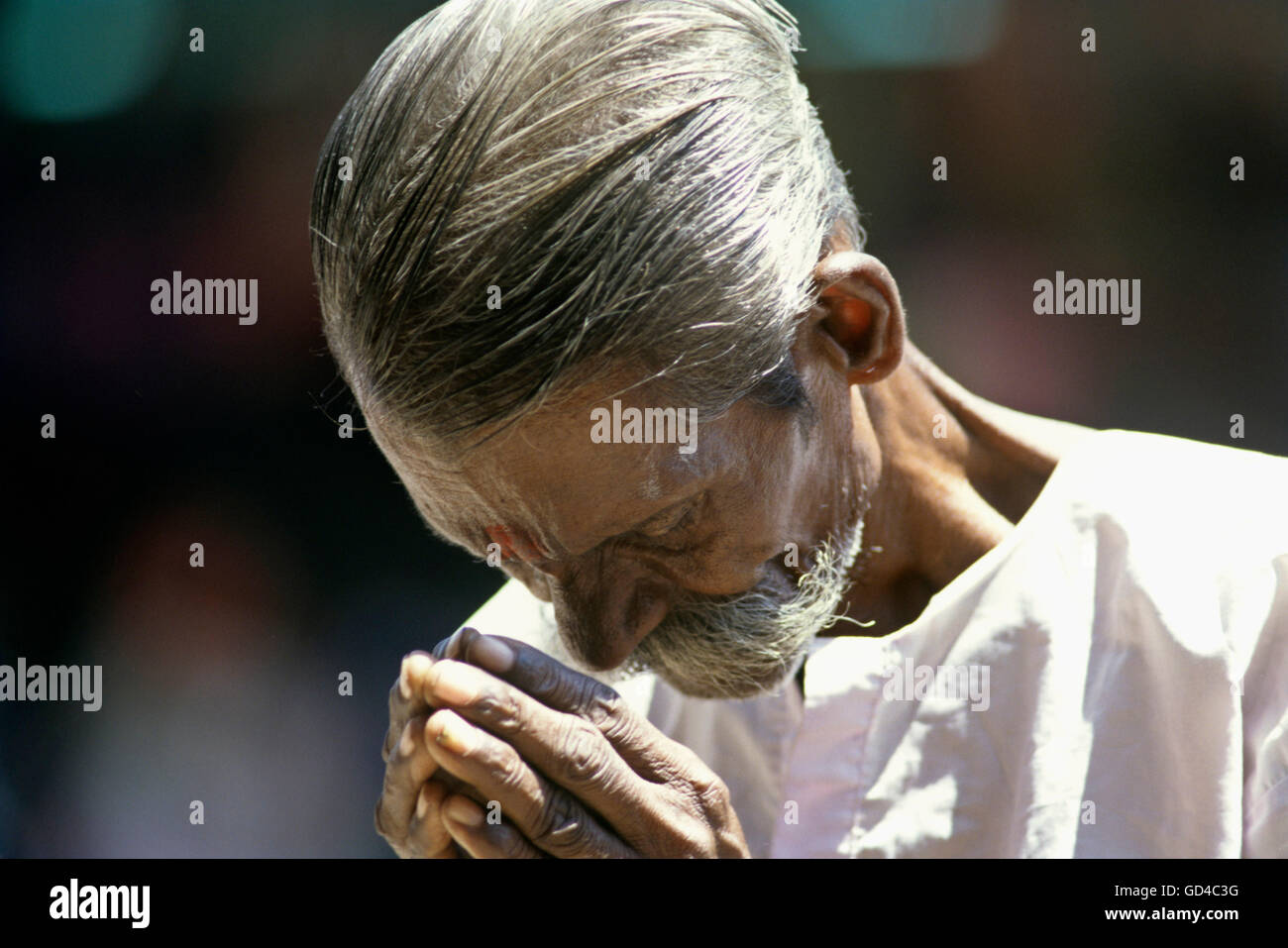Praying old man hi-res stock photography and images - Alamy