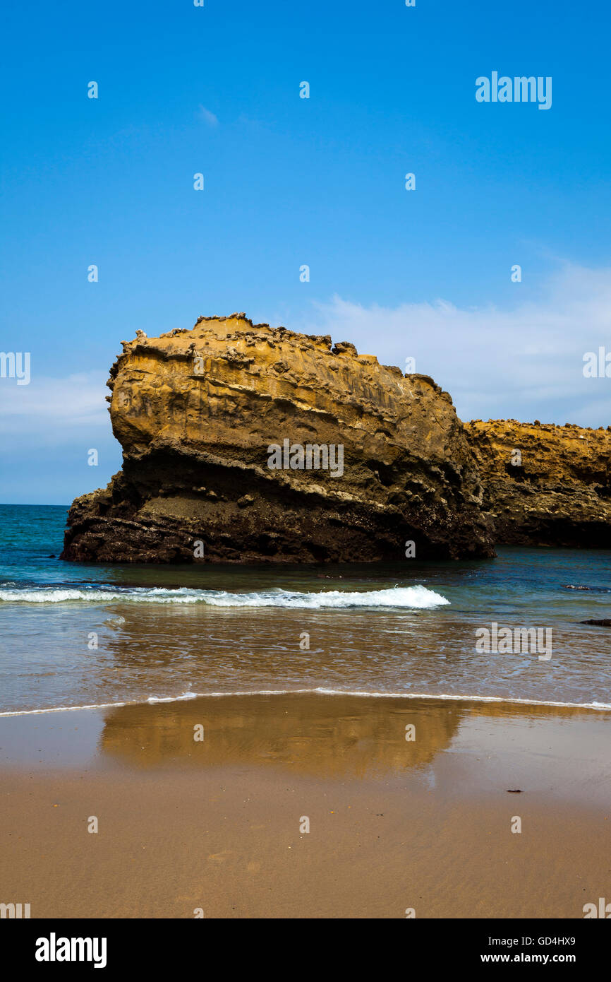 Large rock on the Grand Plage, Biarritz, Pays Basque, France Stock Photo