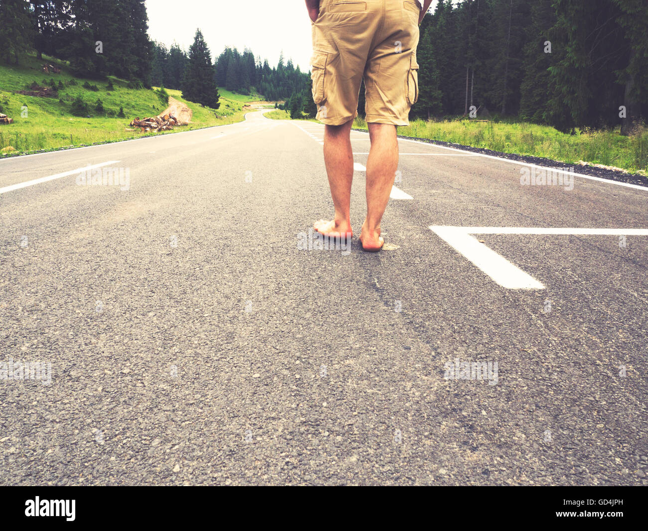 running barefoot on asphalt