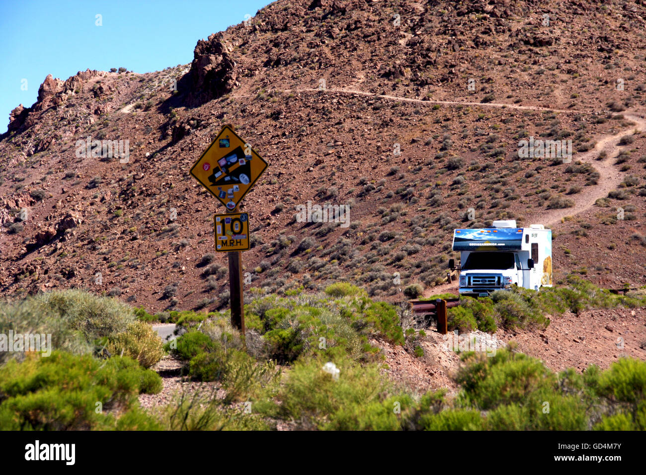 Rental RV Driving on Mountain Road Stock Photo