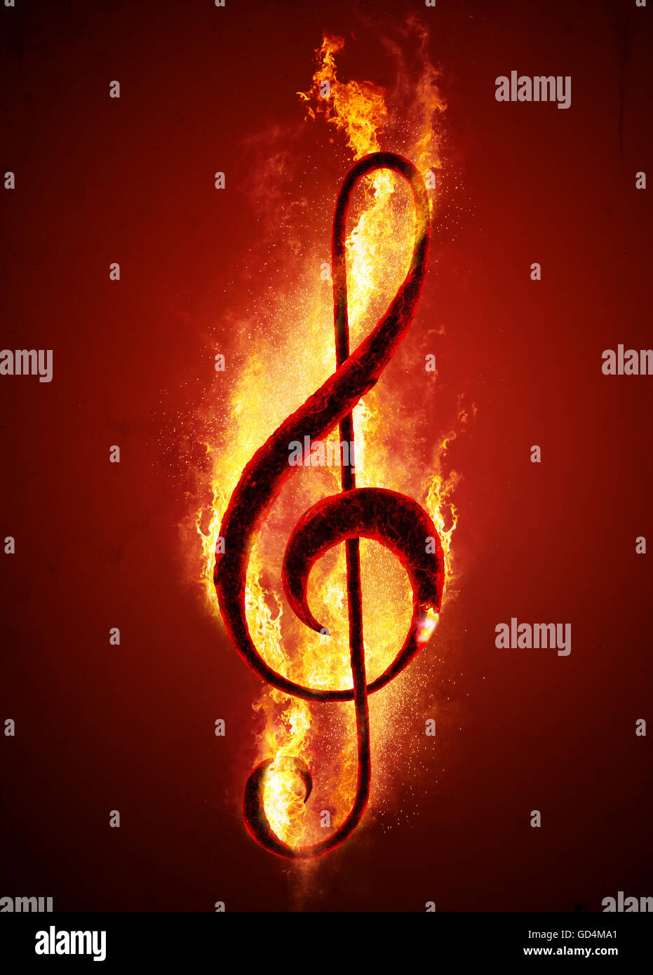 Musical note (treble clef) from hot charcoal on fire. Conceptual image of hot music. Stock Photo