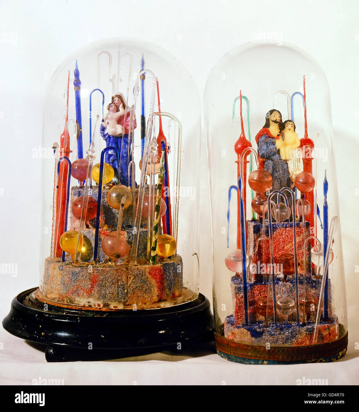 fine arts, folk art, devotional thing, Madonna and Saint Joseph with child under glass covers, glass, wax, Bavaria / Bohemia, early 19th century, Berchtesgaden, Rupert Stoeckl collection, Munich, Artist's Copyright has not to be cleared Stock Photo