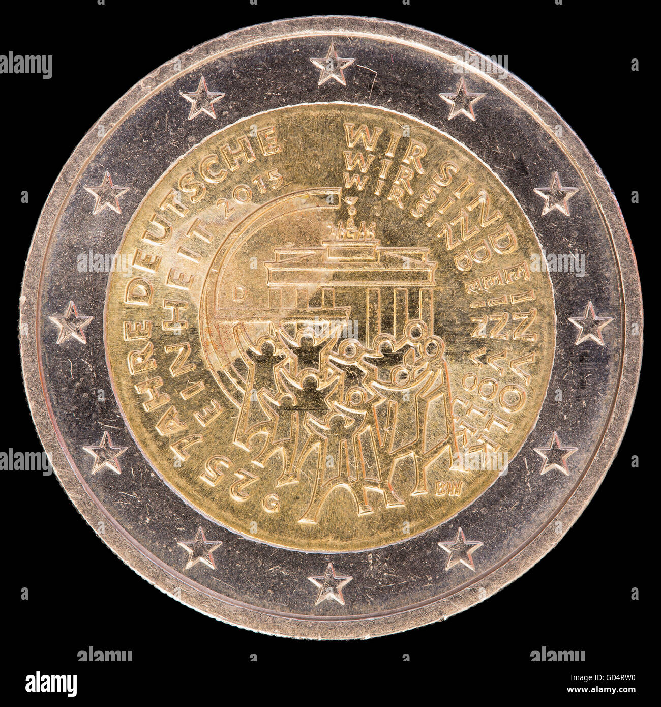 Commemorative circulated two euro coin issued by Germany in 2015 celebrating the German unification with a crowd around the Bran Stock Photo