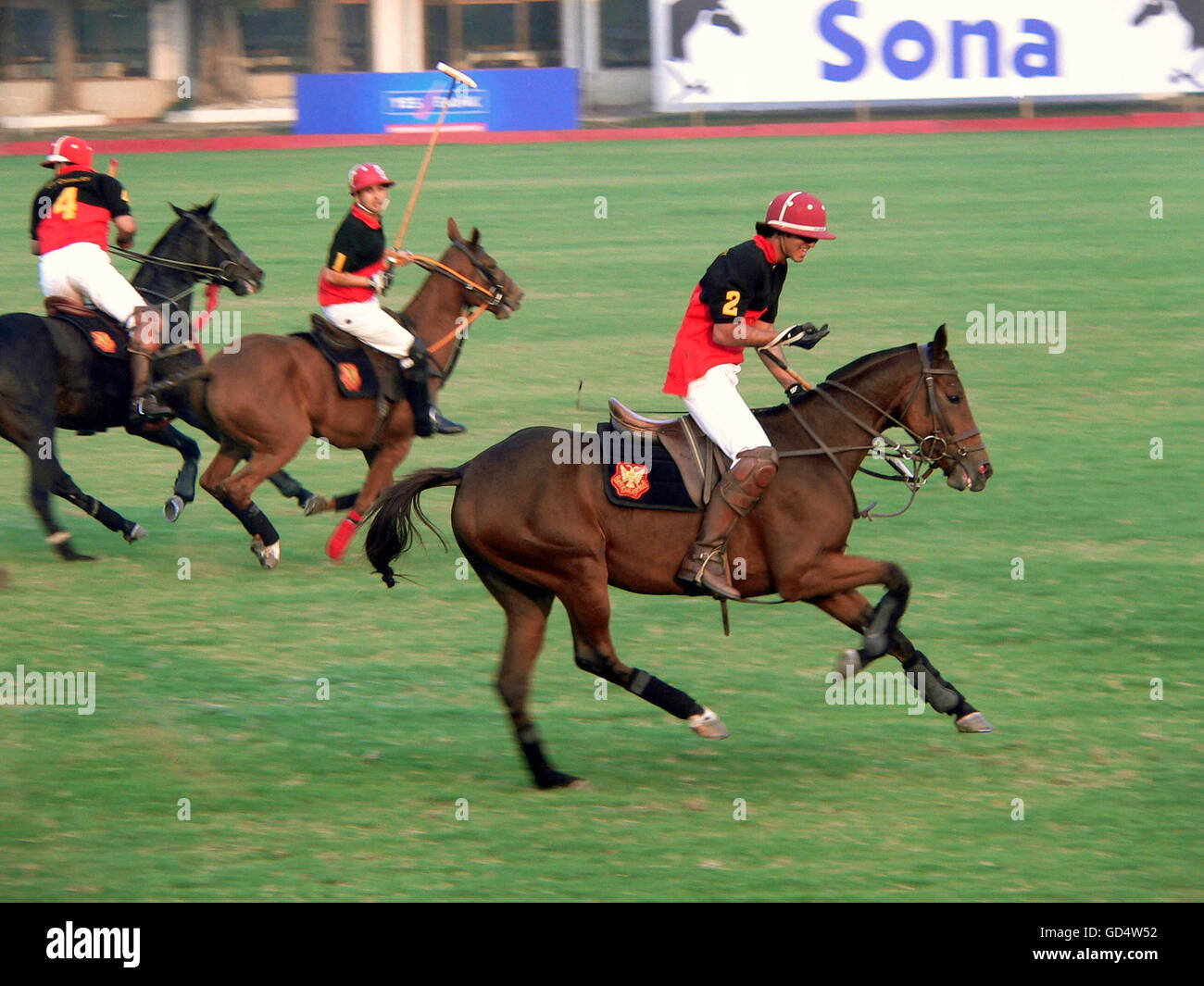 Polo players in action Stock Photo Alamy