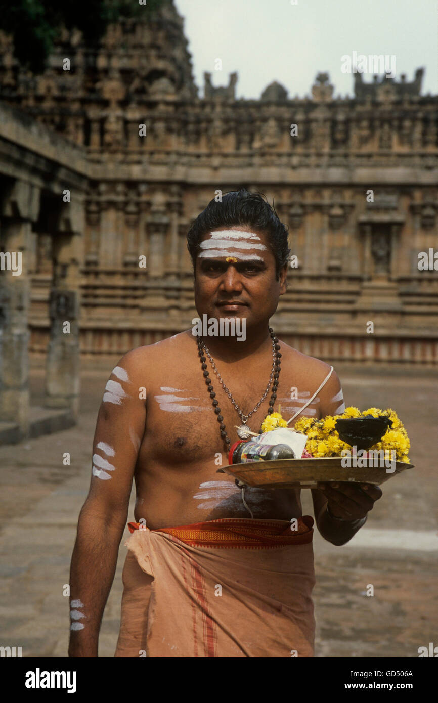 Priest With Offering , Thajavur , Brahadeeswara Temple Stock Photo