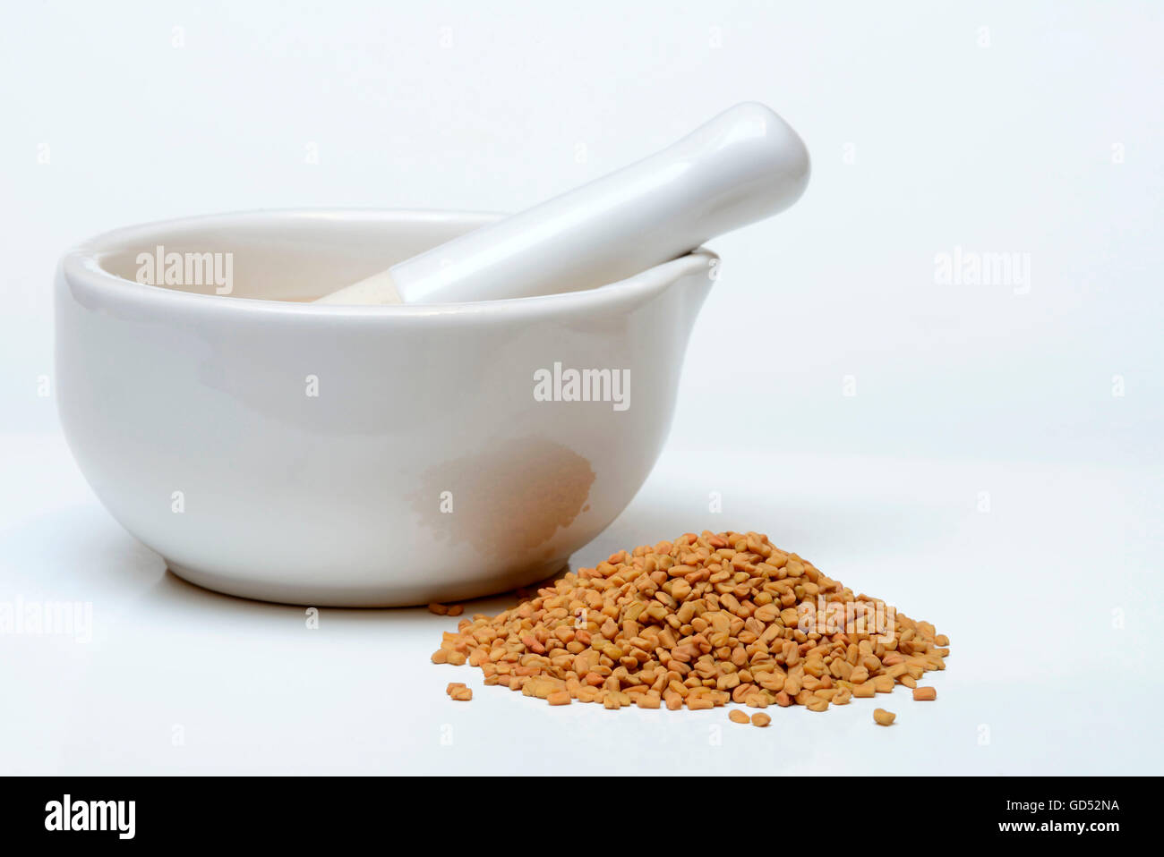 Fenugreek / (Trigonella foenum-graecum) / mortar Stock Photo