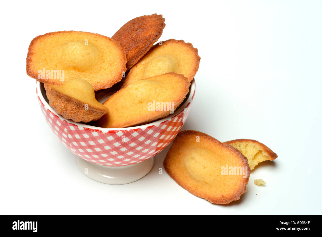 Madeleines in bowl Stock Photo