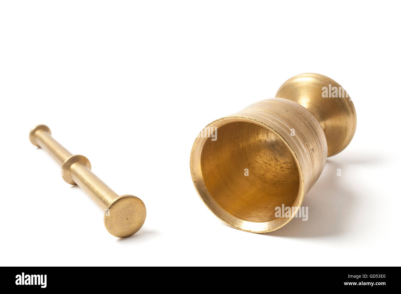Stock image of a little brass mortar isolated on white background. Stock Photo