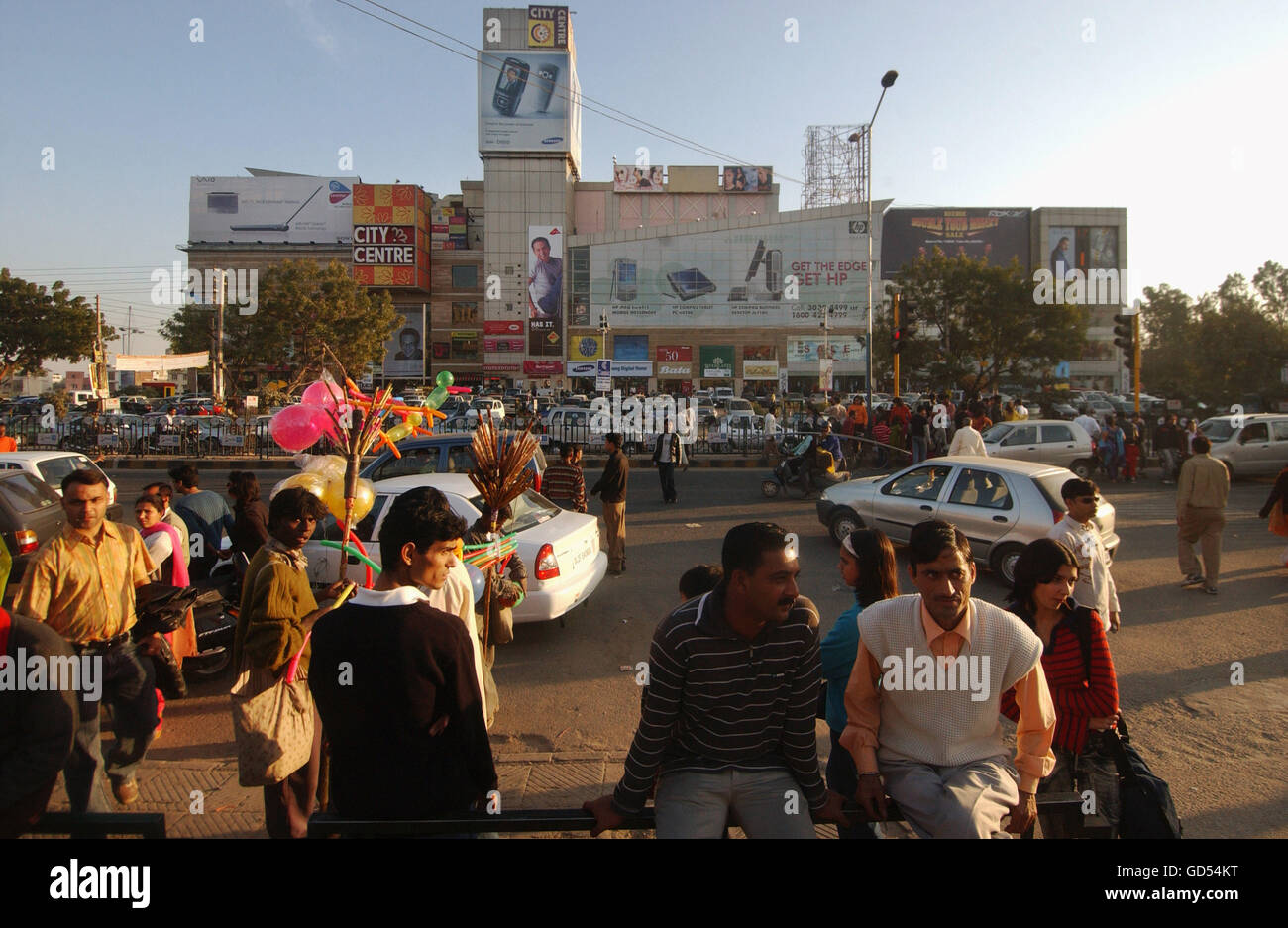 People sit outside the mall Stock Photo - Alamy