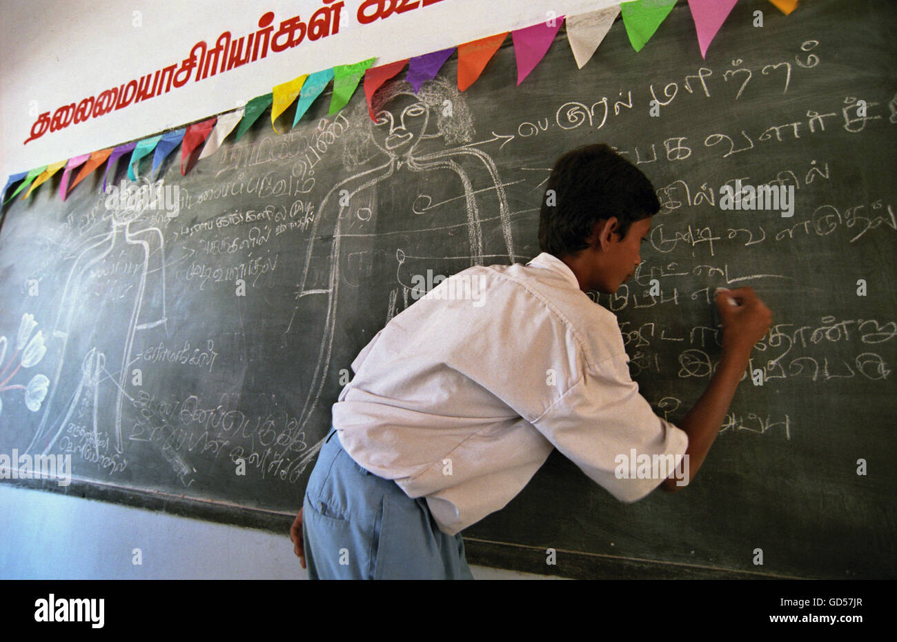 student displays the anatomy of a human body during a session on AIDS, in a govt school Namakkal, Tamil Nadu,India. Stock Photo