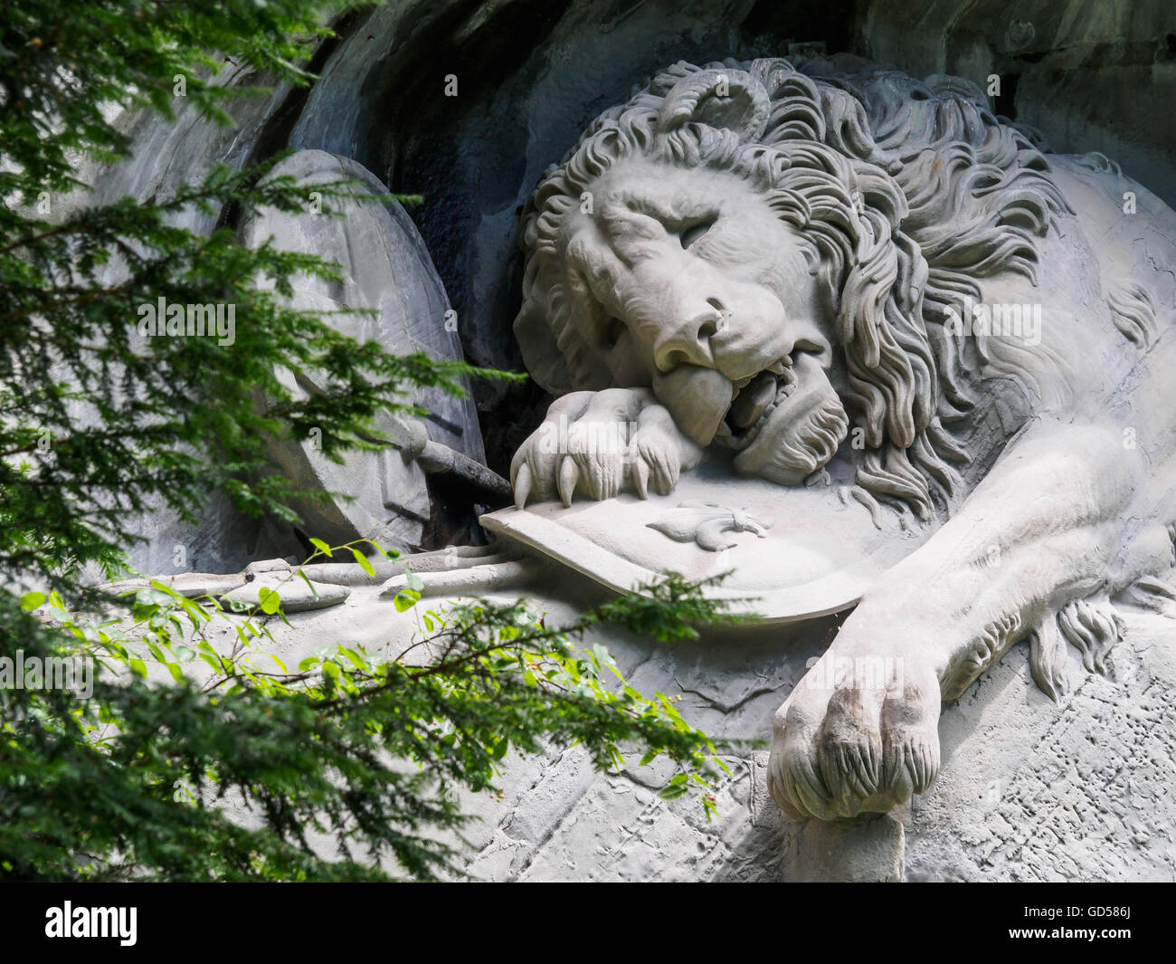 Lewendenkmal, the lion monument landmark in Lucerne, Switzerland. It was carved on the cliff to honor the Swiss Guards of Louis Stock Photo