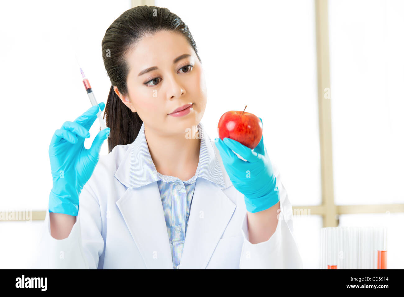 Scientist analizing genetic modification food DNA in laboratory Stock Photo