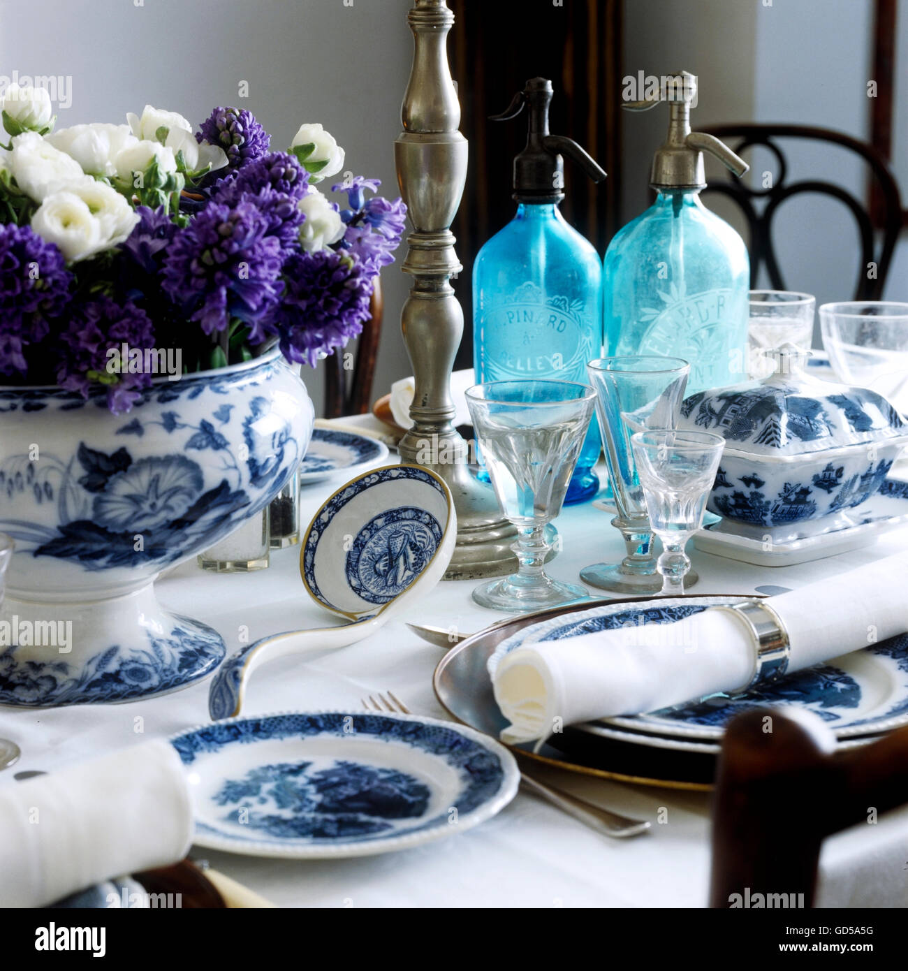 Blue willow china on set table Stock Photo