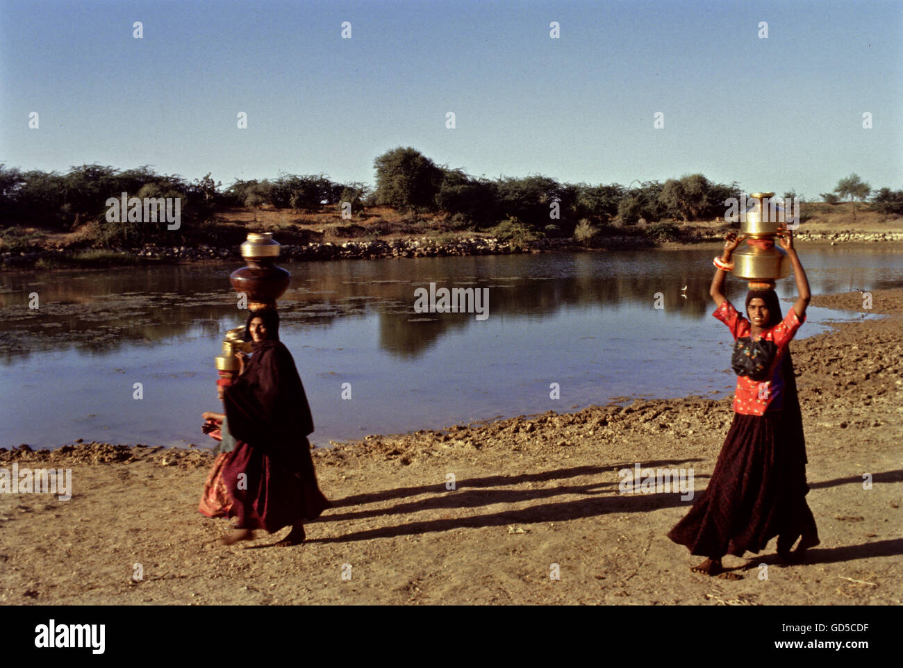 Women fetching water Stock Photo