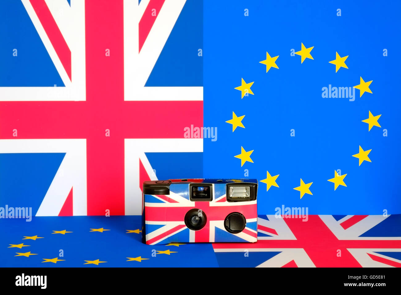 disposable film camera against eu and union flags Stock Photo Alamy