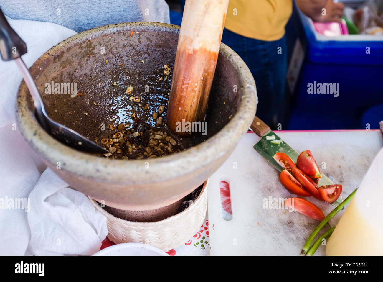 Pestle and mortar making of papaya salad,Chiang Mai Thailand Stock