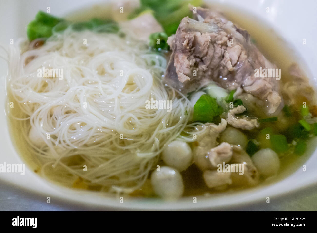 Vermicelli rice noodles with pork bone and fish balls in delicious hot