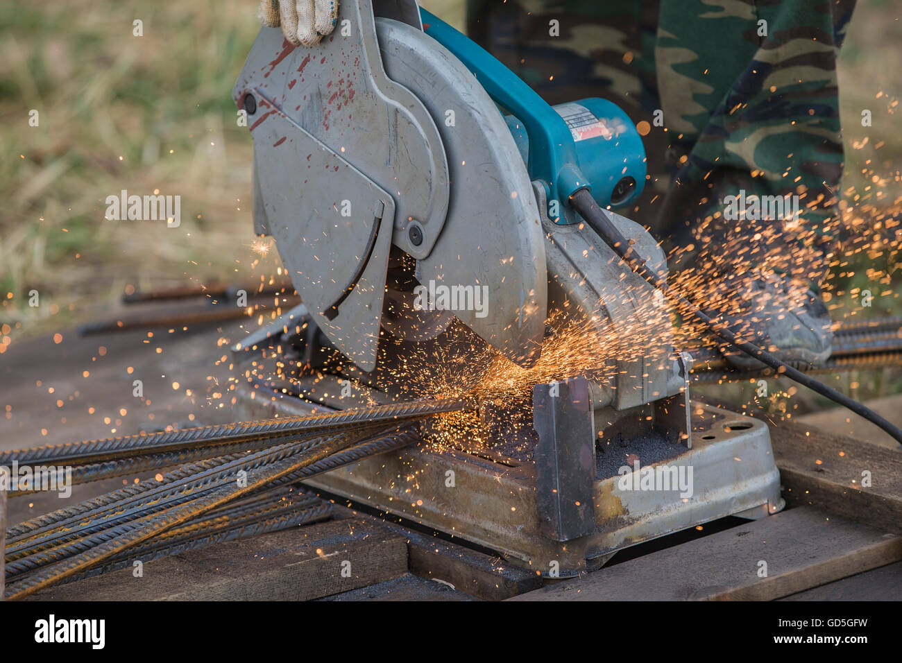 Work on building cuts the electric tool parts Stock Photo Alamy