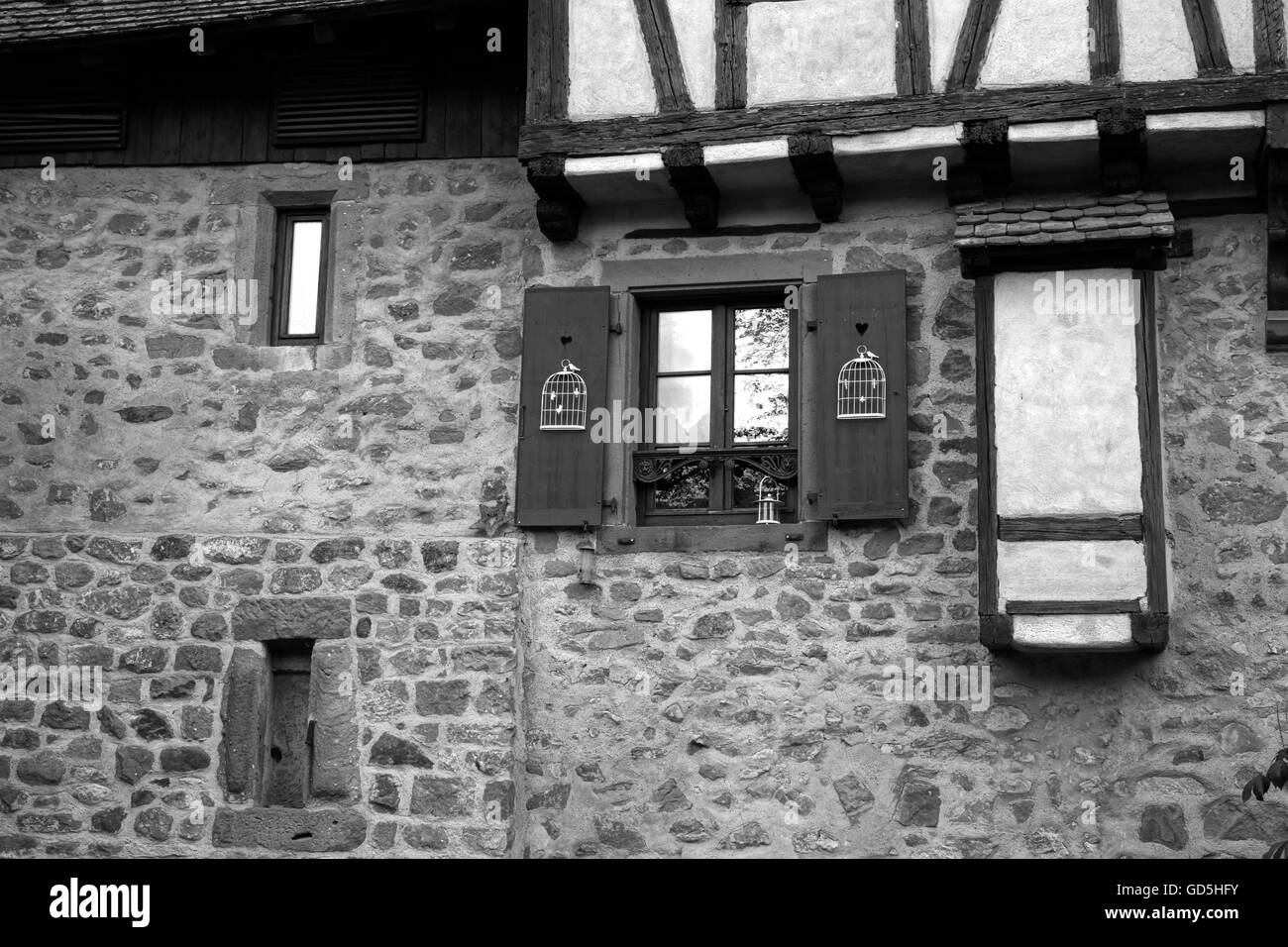 Windows and stone wall, riquewihr colmar, france, europe Stock Photo