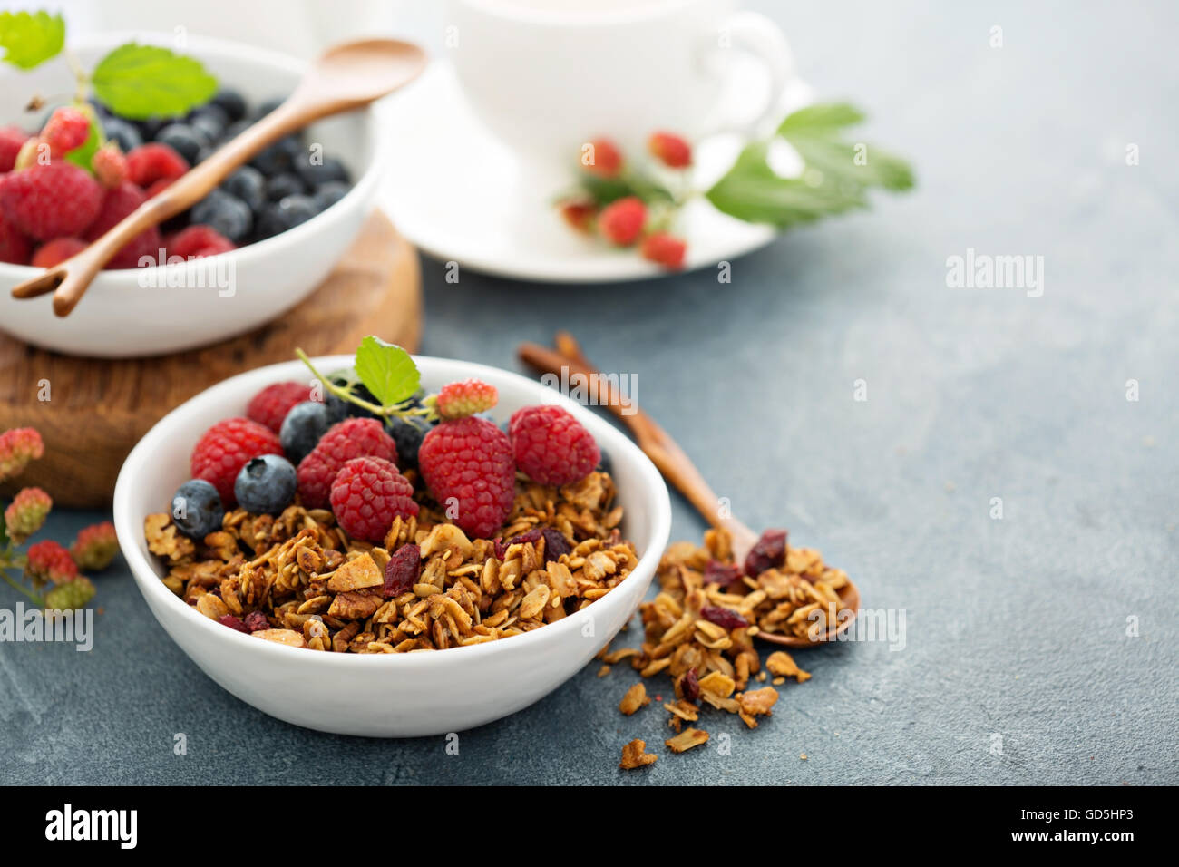 Granola and berries with coffee Stock Photo