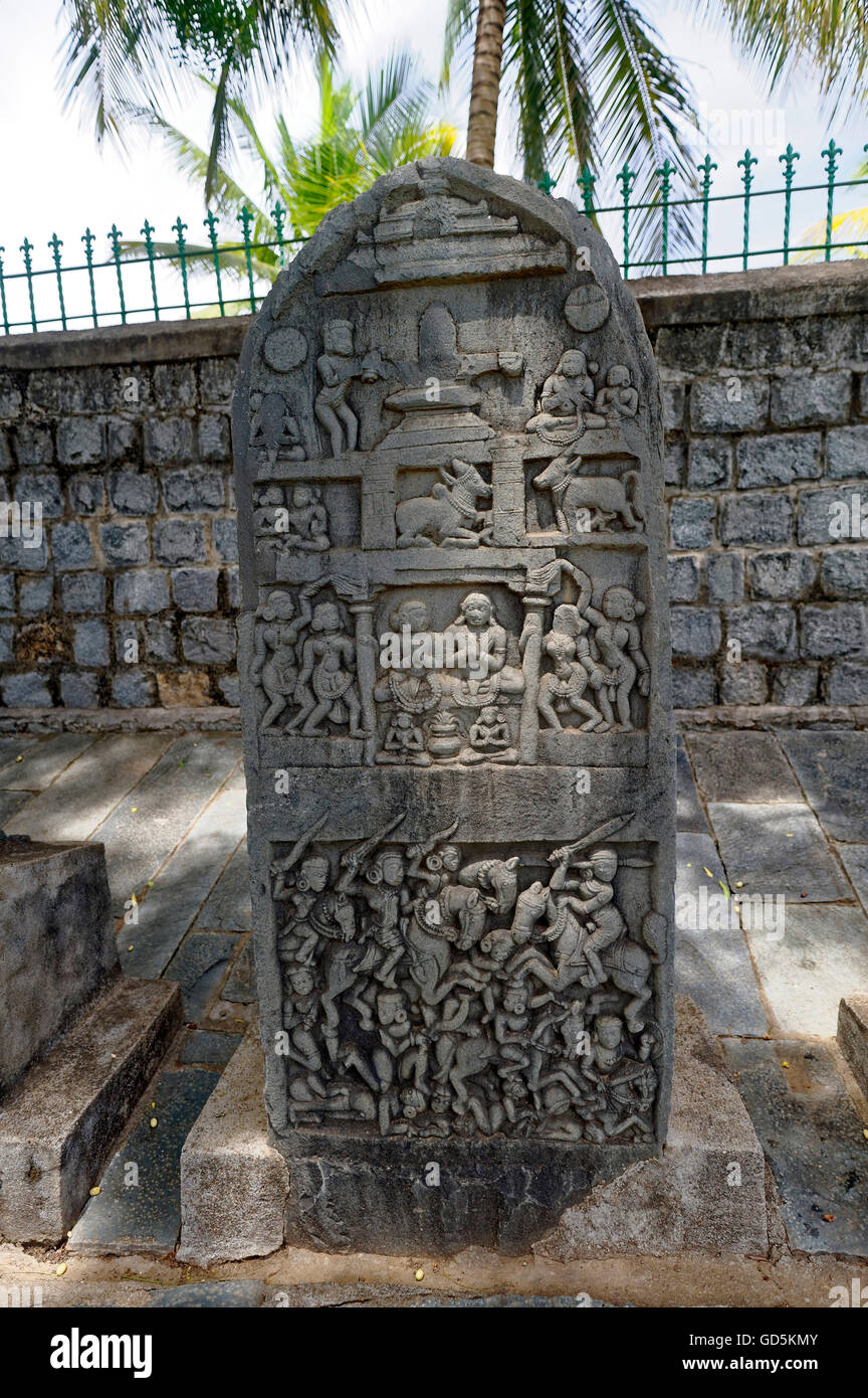 War and peace carved on rock, someshwar temple, haveri, karnataka, india, asia Stock Photo