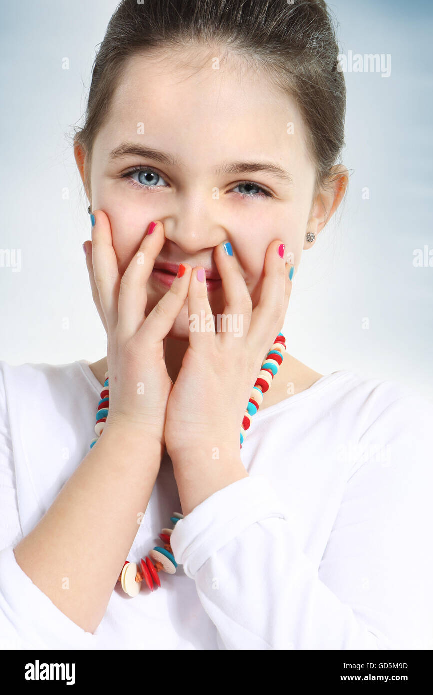 Little girl with colourful nails,closeup Stock Photo