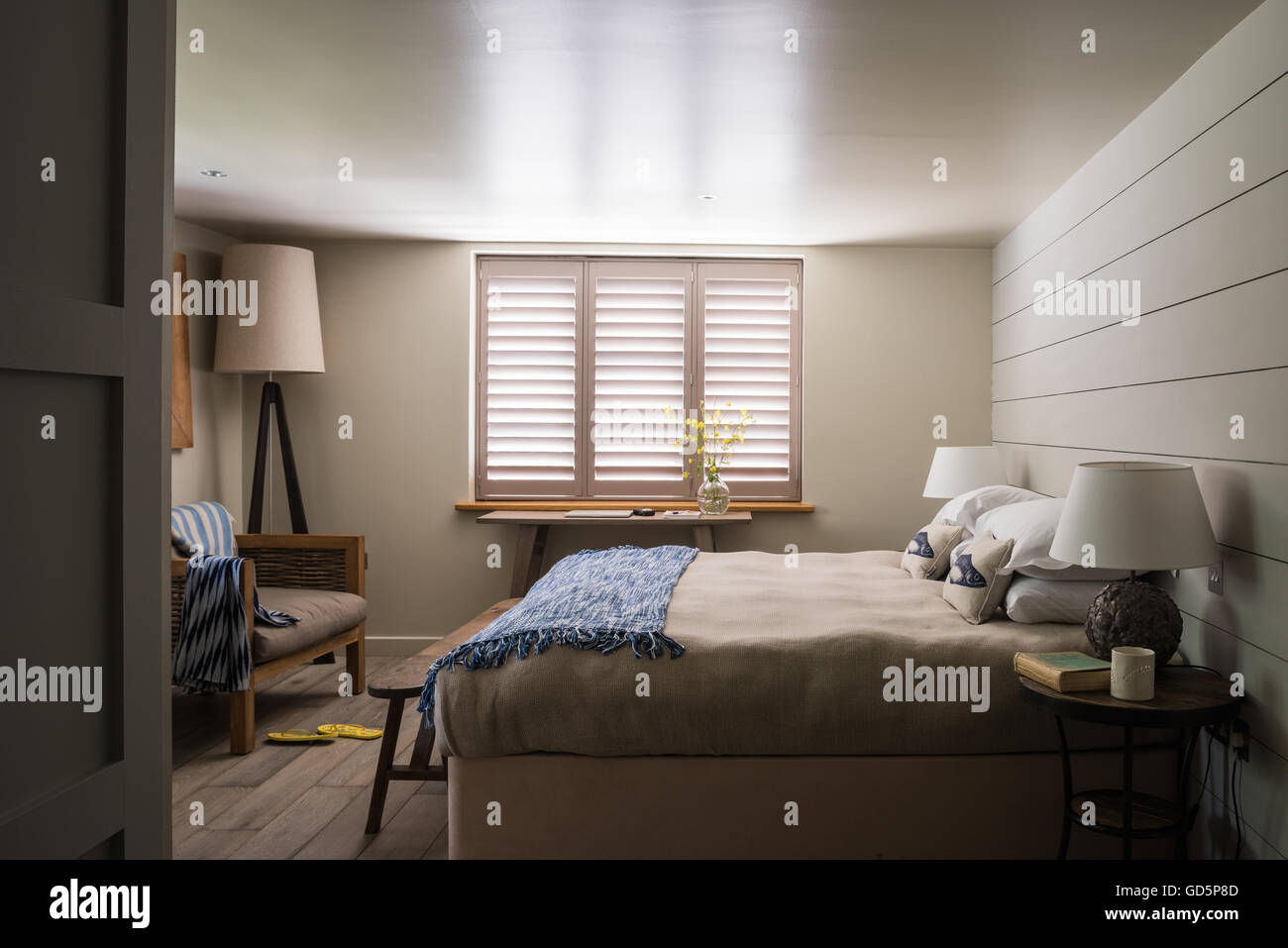 Plantation Shutters In Bedroom With Smoked Oak Floorboards