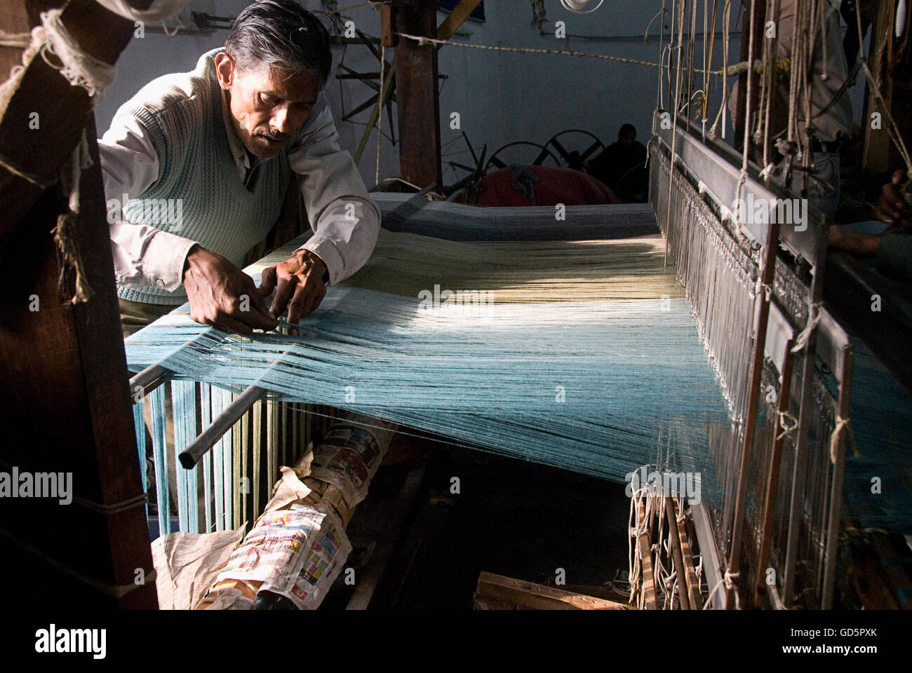 Thread weaving machine Stock Photo - Alamy