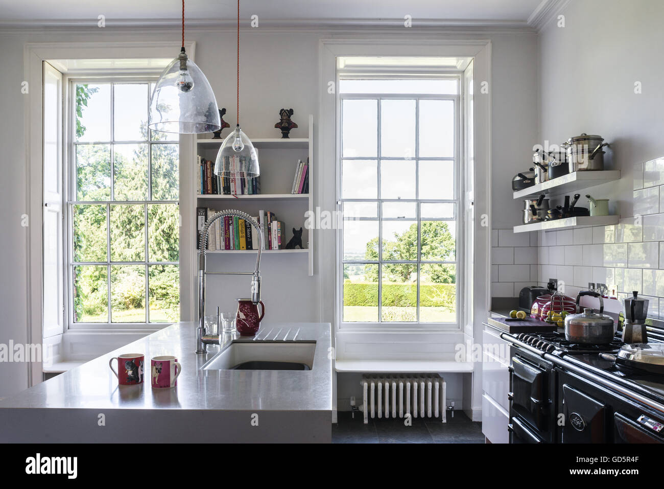 High Ceilinged Kitchen With Aga And White Metro Tiles Work