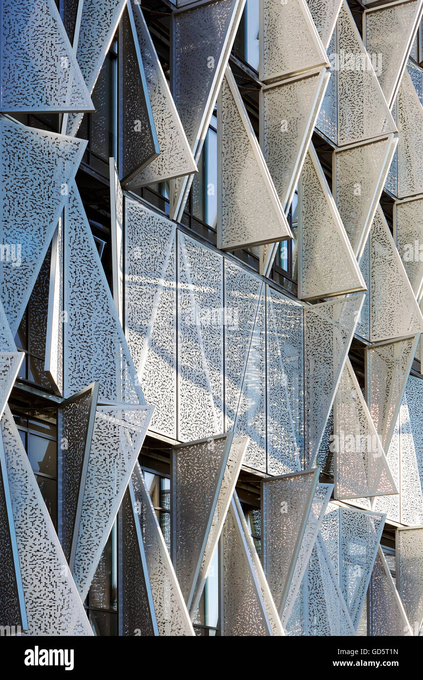 Exterior facade with adjustable triangular perforated steel shutters. SDU Campus Kolding, Kolding, Denmark. Architect: Henning Larsen Architects, 2015. Stock Photo