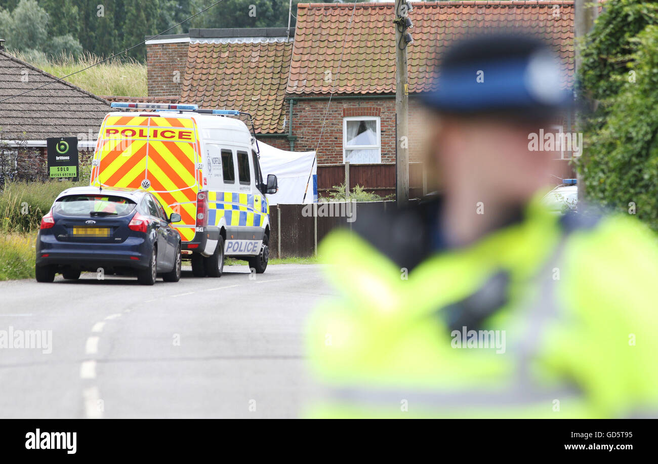 NOTE REGISTRATION PLATE PIXELATED BY THE PA PICTURE DESK A police tent ...