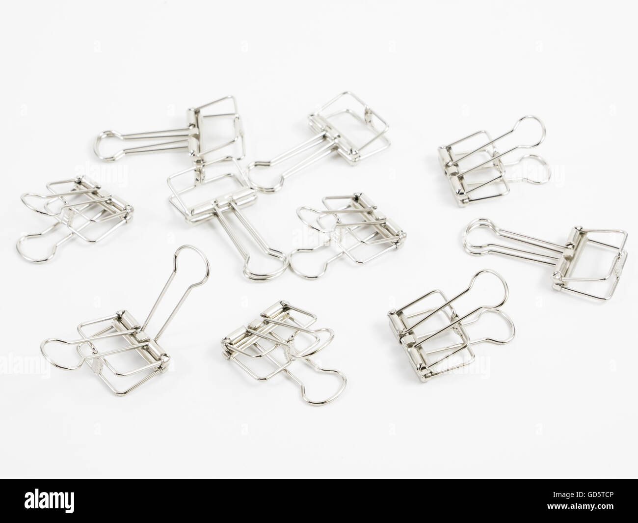 The silver binder clip (paper clip stationery Stock Photo - Alamy