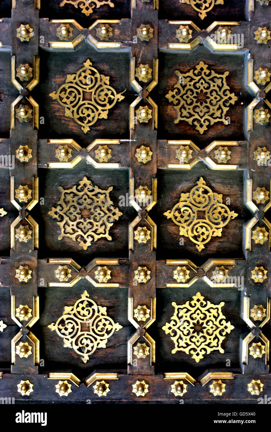 Brass and wooden door Stock Photo