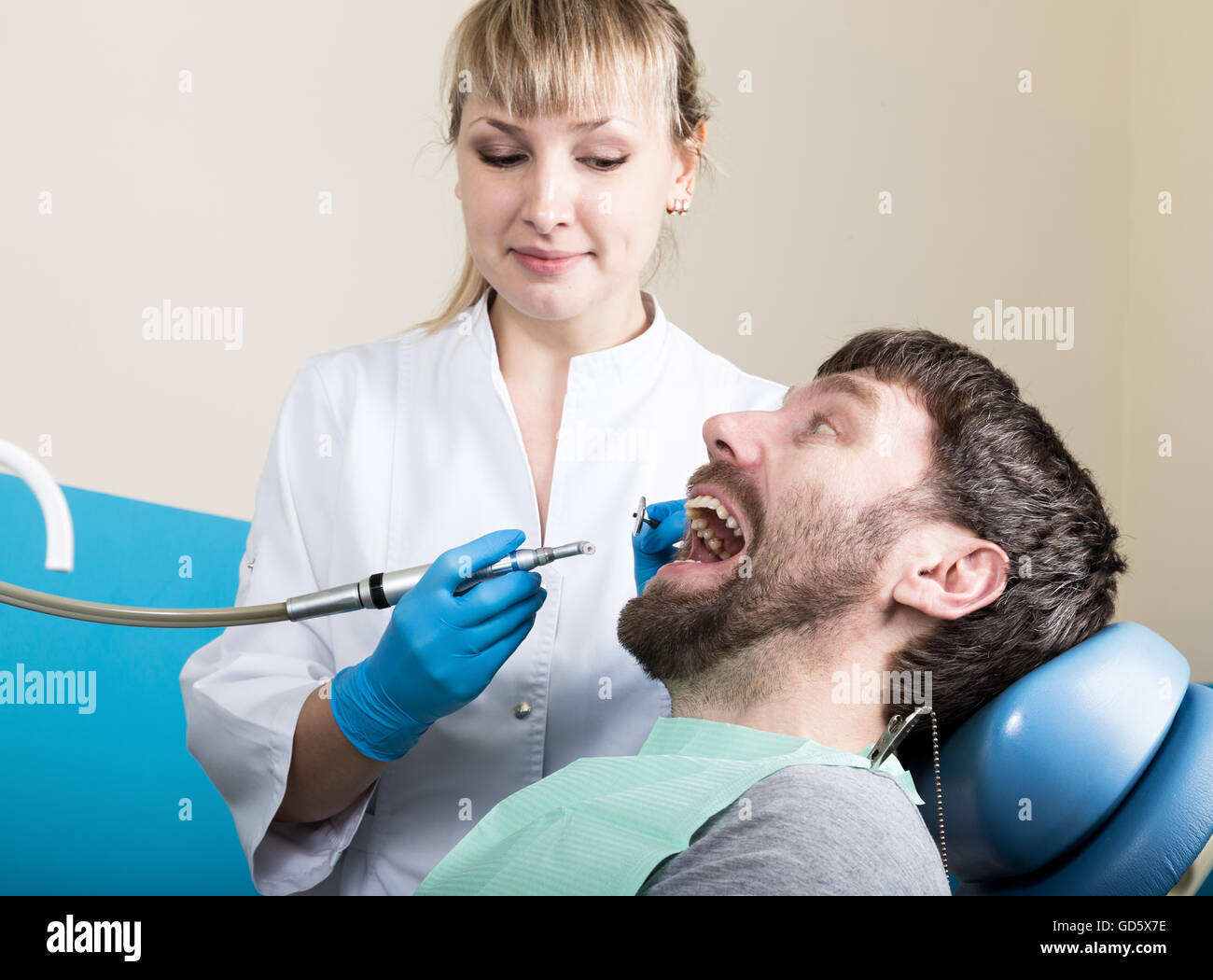 Doctor examines the oral cavity on tooth decay. Caries protection
