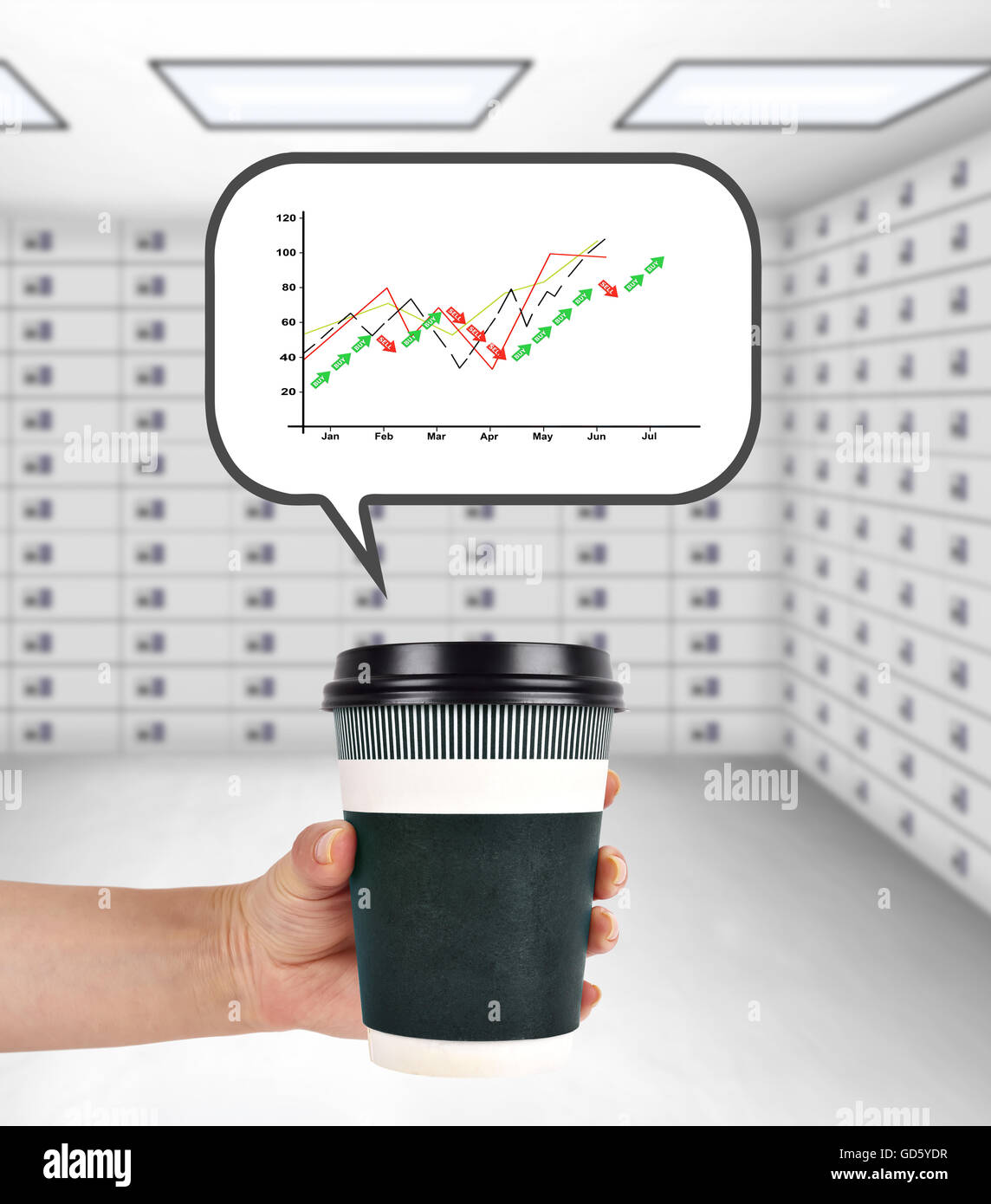 hand holding disposable coffee cup with stock chart Stock Photo