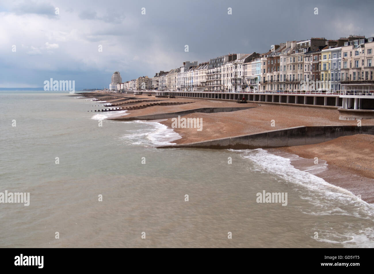 27th APRIL 2016. HASTINGS, EAST SUSSEX, UK. Hastings seafront, viewed from the pier. Stock Photo