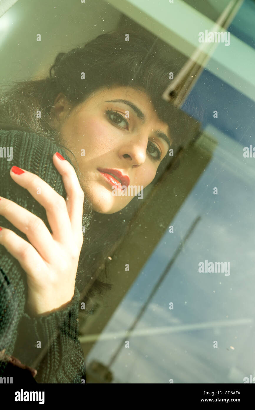 Free Photos - In This Stock Photo, A Young Woman With A Melancholic  Expression Is Standing Next To An Old, Dusty Microwave Oven In A Dimly Lit  Room. The Woman Seems To