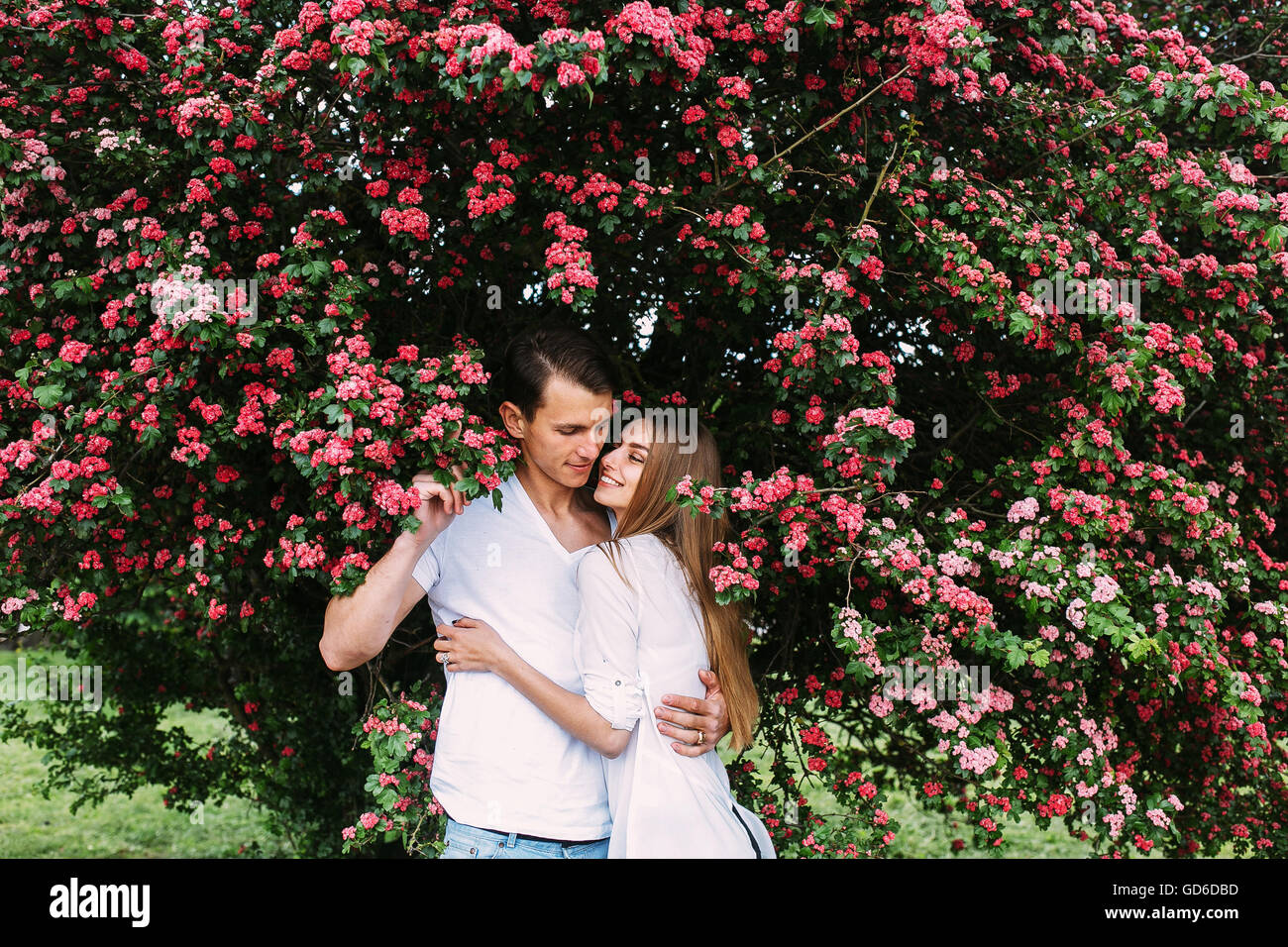 Young happy couple in love outdoors Stock Photo - Alamy