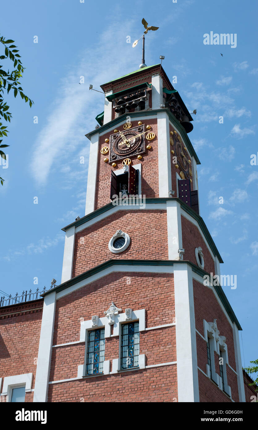 Orenburg, Russia -June 23, 2016. View on The clock tower in center of Orenburg city on summer time, Russia Stock Photo