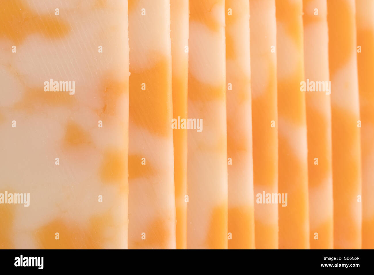 A very close view of Colby-Jack cheese slices. Stock Photo