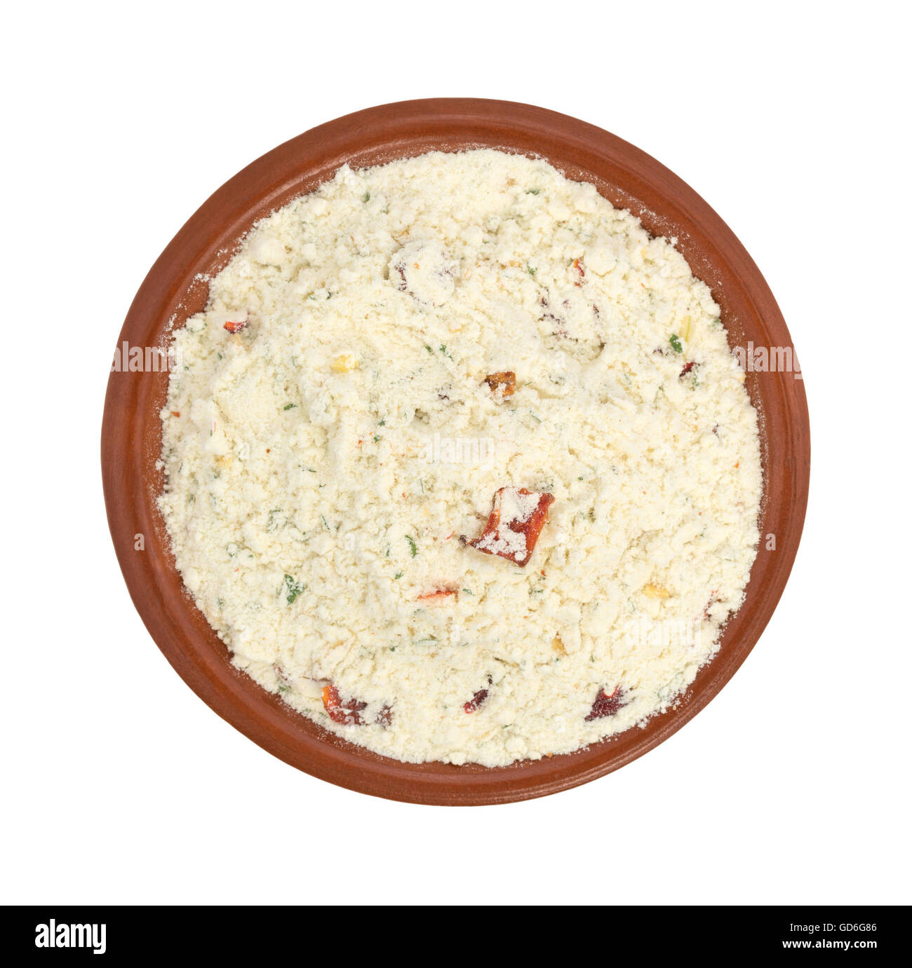 Top view of a small bowl filled with guacamole seasoning mix isolated