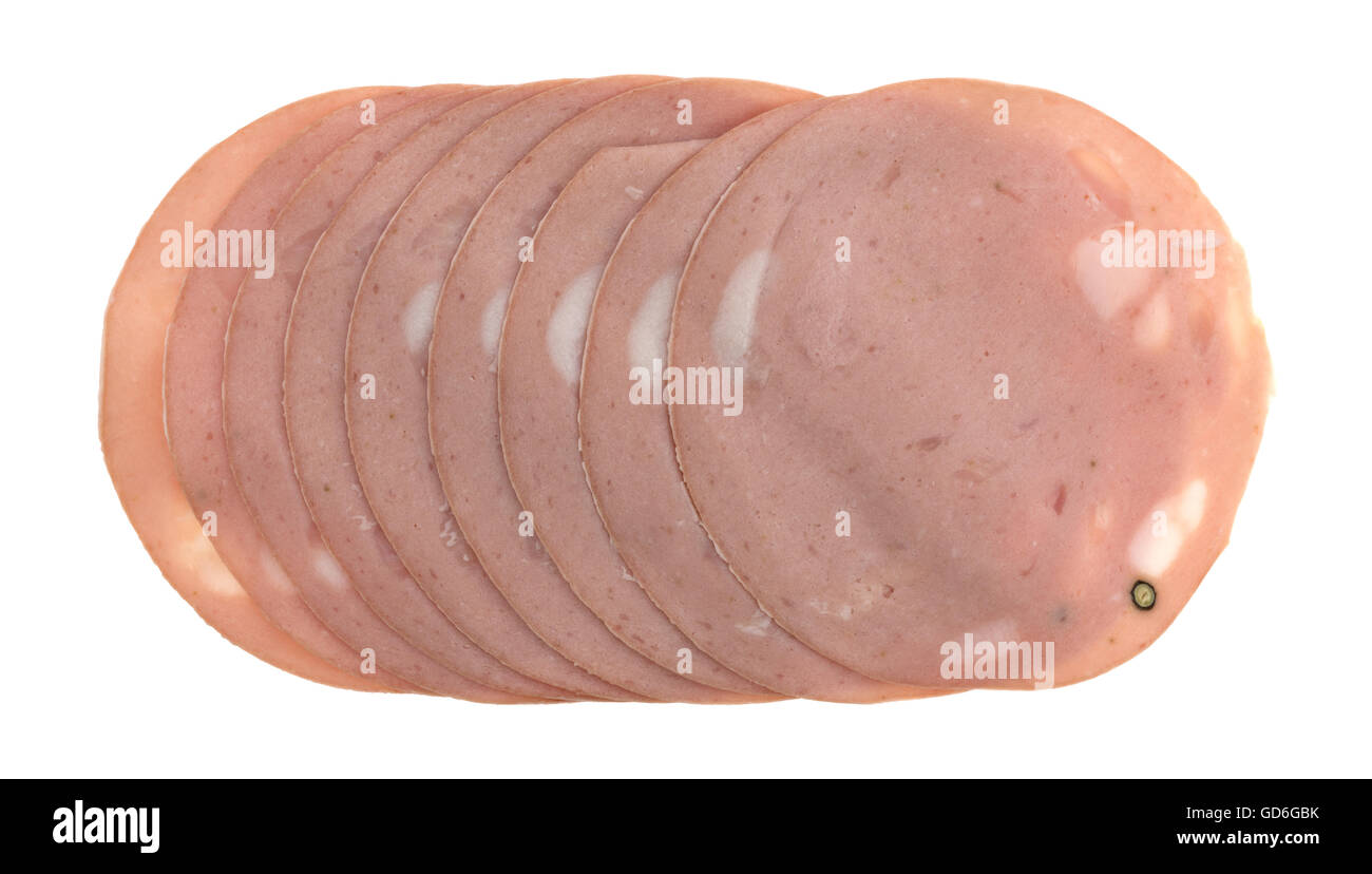 Top view of several slices of thin slices of mortadella luncheon meat isolated on a white background. Stock Photo