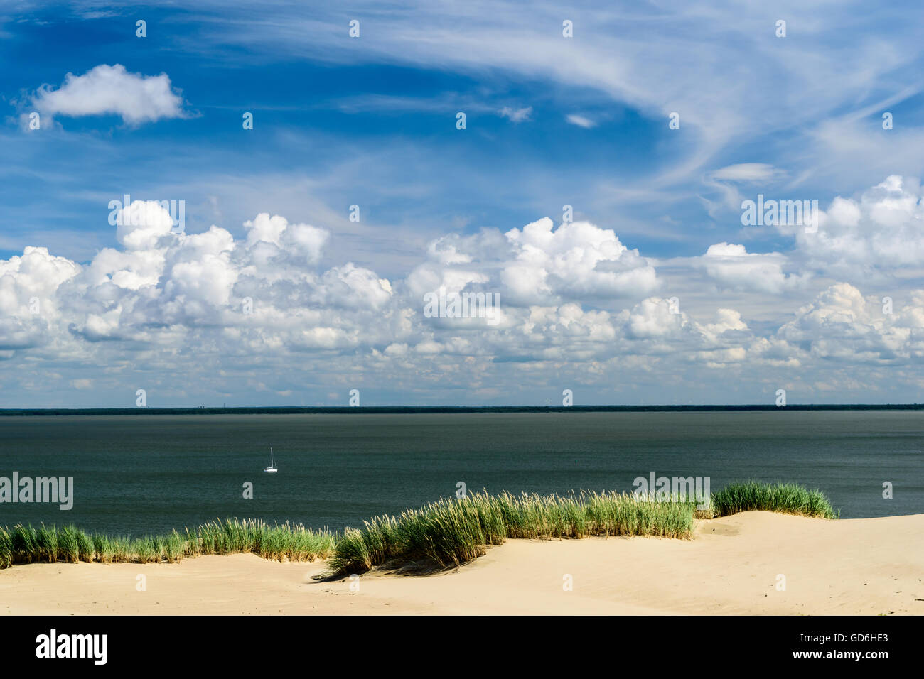 Deep blue sky and sailing ship in the ocean Stock Photo - Alamy