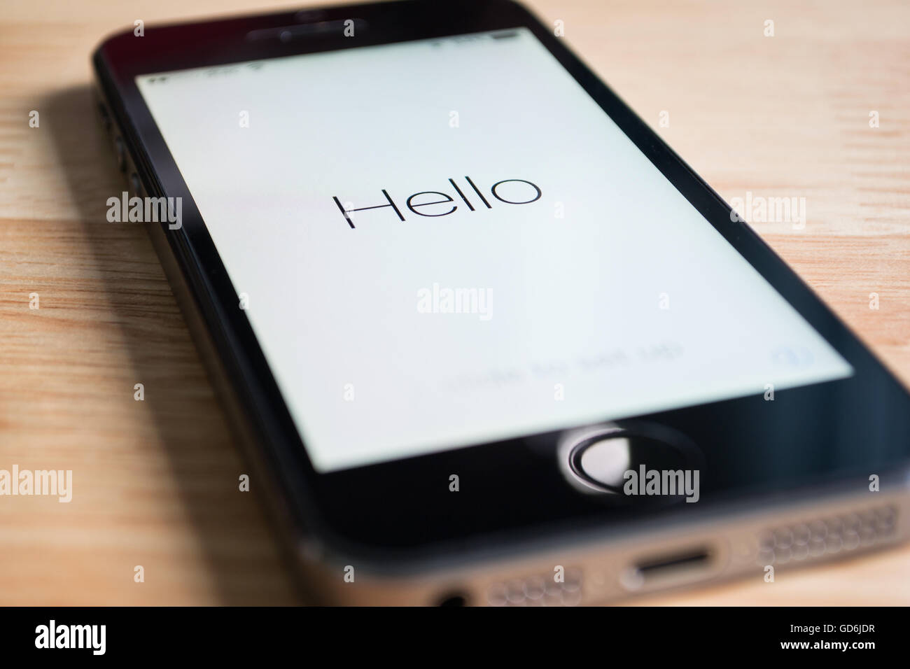 Bangkok, Thailand - March 23, 2016 : Apple iPhone5s showing its screen 'Hello', when the software has been updated. Stock Photo