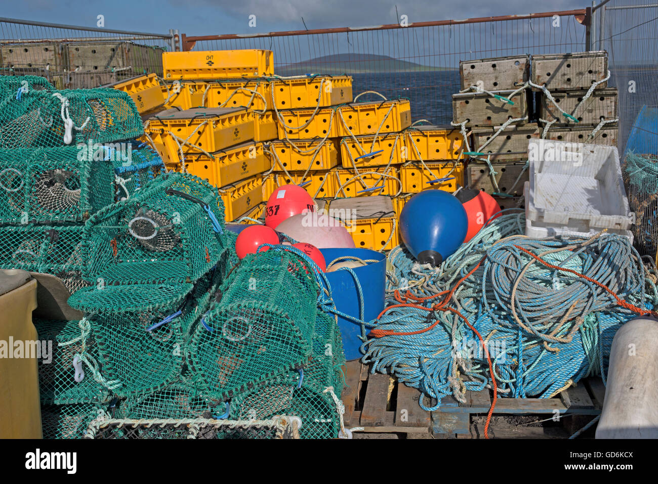 Crab and Lobster pots & Fishing Gear beside the harbour wall at Tingwall, Evie. on the Orkney Isles.  SCO 10, 584. Stock Photo